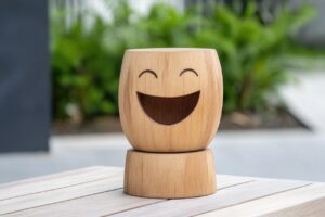 ai generated, positive vibes, minimalist, wooden, figurine, smiling, cheerful, decoration, positive, vibes, happy, wooden figurine, smiling decoration, minimalist decor, table